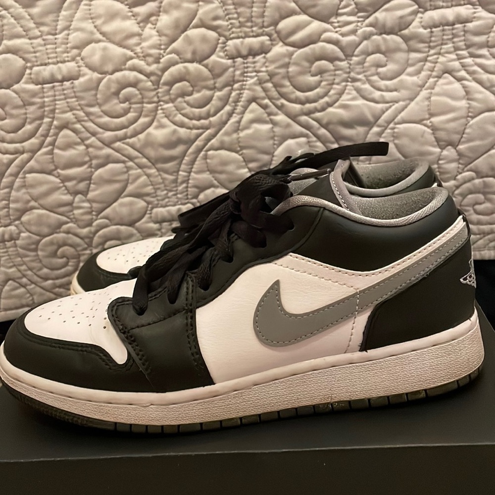 Black white and gray Air Jordan 1 Low.